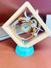 Golden Women's Bracelet Watch with Chic Dial and Elegant Strap