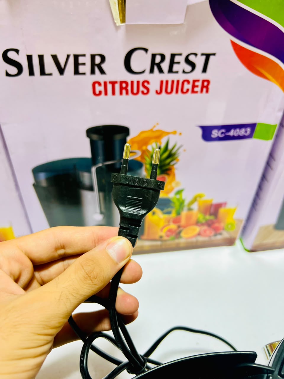 Silver Crest Fruit Juicer With Two Speed Settings I And II For Efficient Juicing Of Various Fruits And Durable Daily Home Use Design